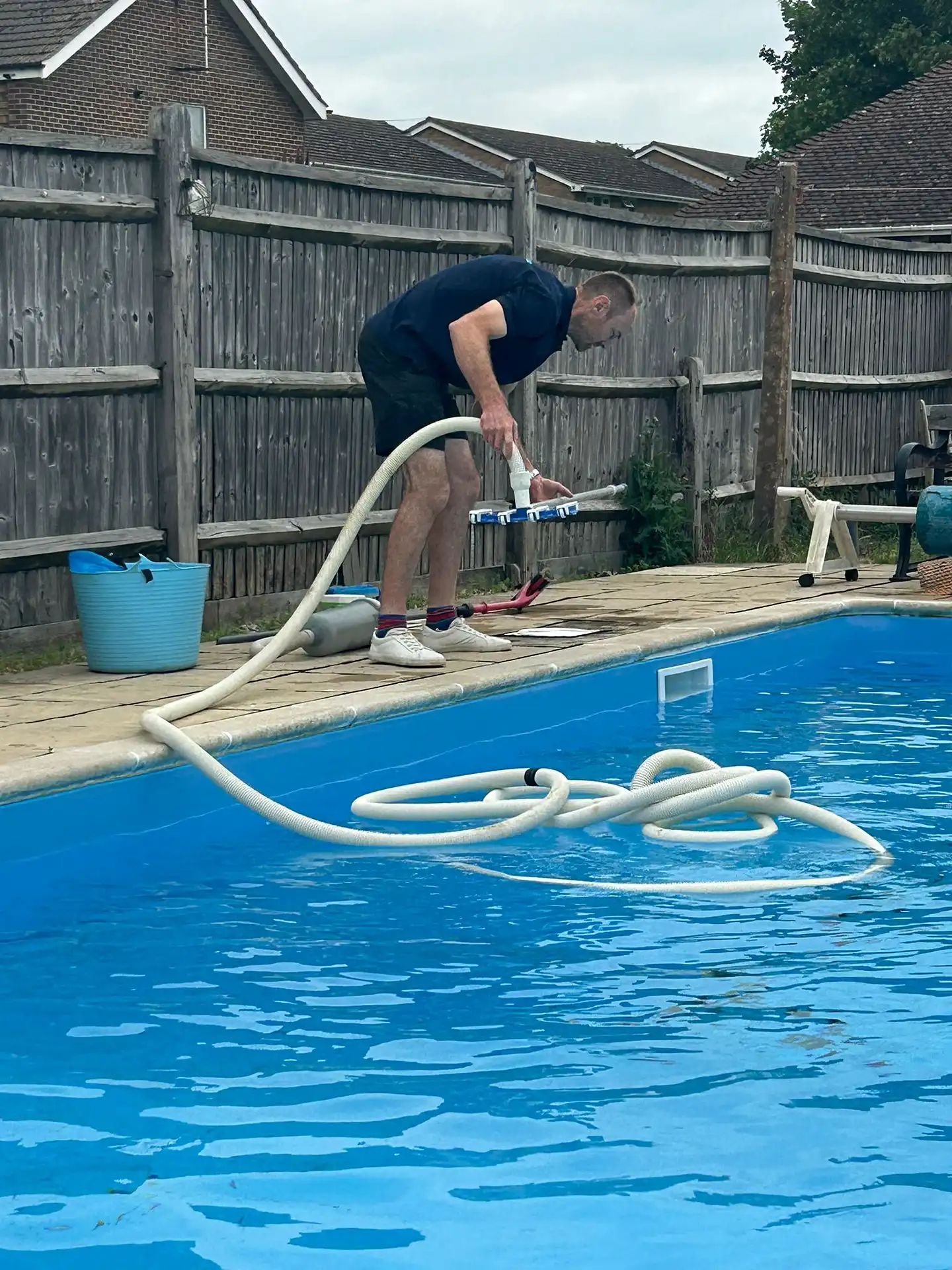 Pool maintenance visit: water testing and cleaning